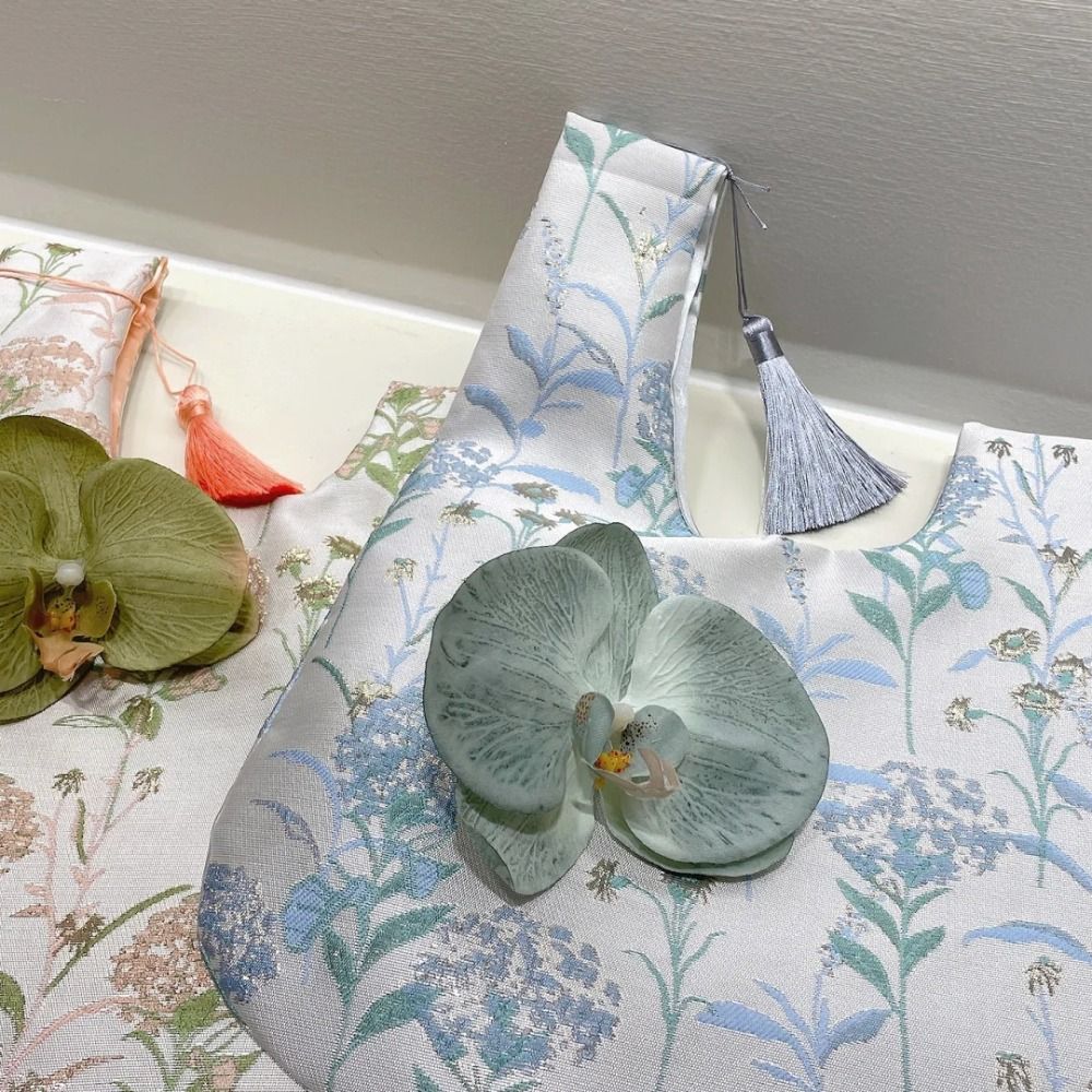 Bolso de muñeca con nudo de es - Embroidery Knot reseña y precio